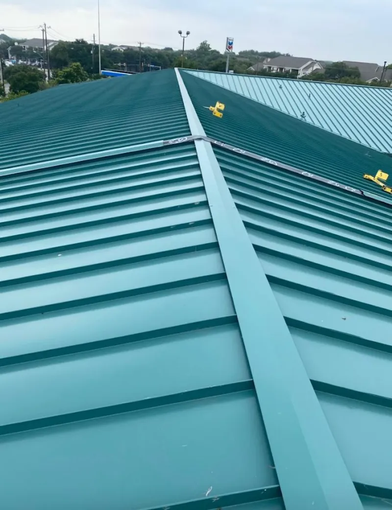 Green commercial metal roof ridge and valley for Metal Roof Repair in Bothell East